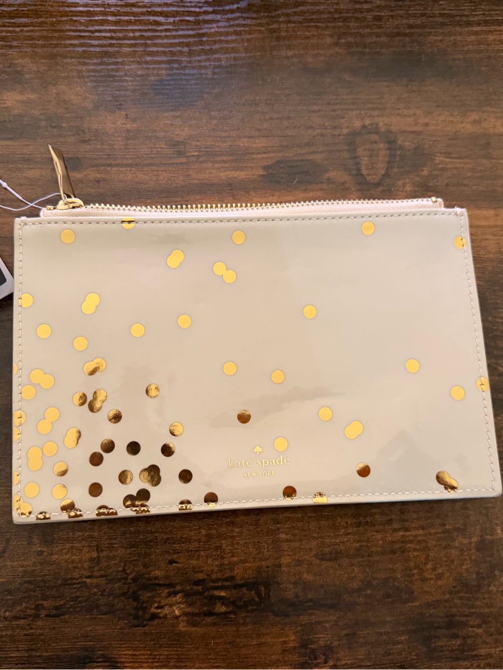 kate spade beige patent pouch with metallic gold polka dots